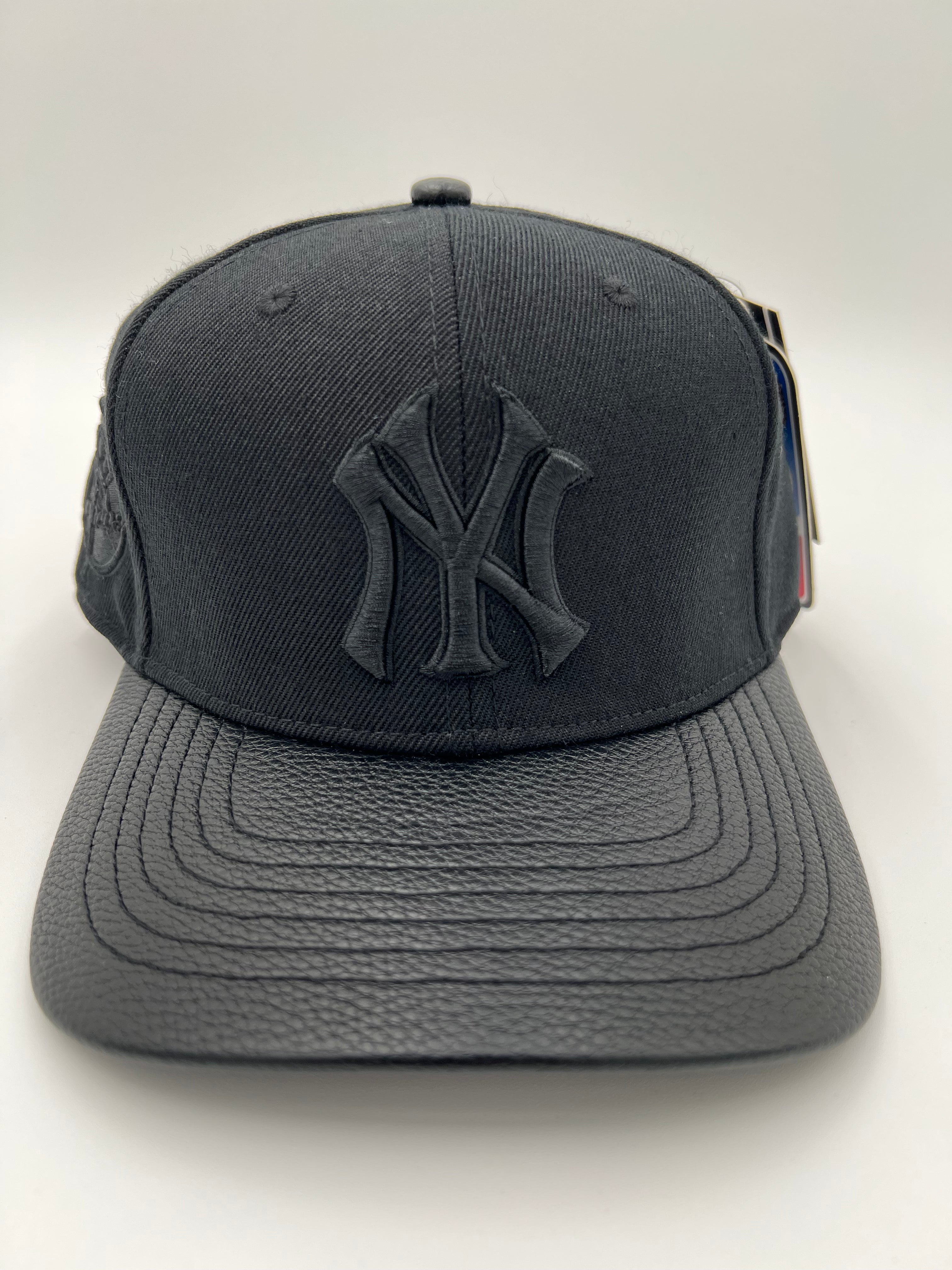NY Yankees Pinched Leather Brim SnapBack Hat (Multiple Colors