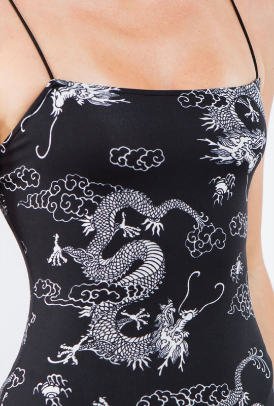 Black and white dragon design spaghetti strap dress up close