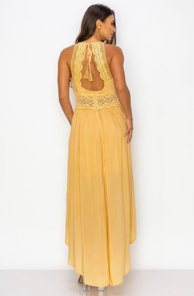 Yellow flowy spaghetti strap dress back view