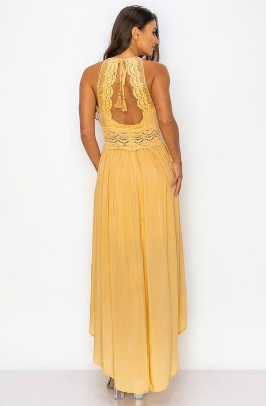 Yellow flowy spaghetti strap dress back view
