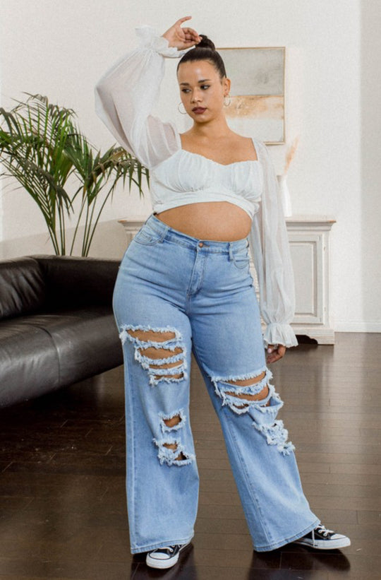 Blue high waisted distressed wide leg jeans front view