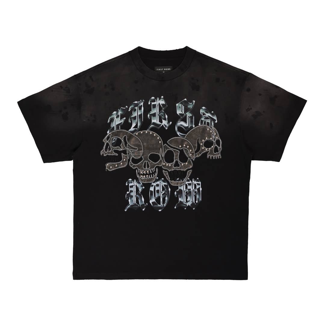 Black t-shirt with metallic skull design and text on a white background
