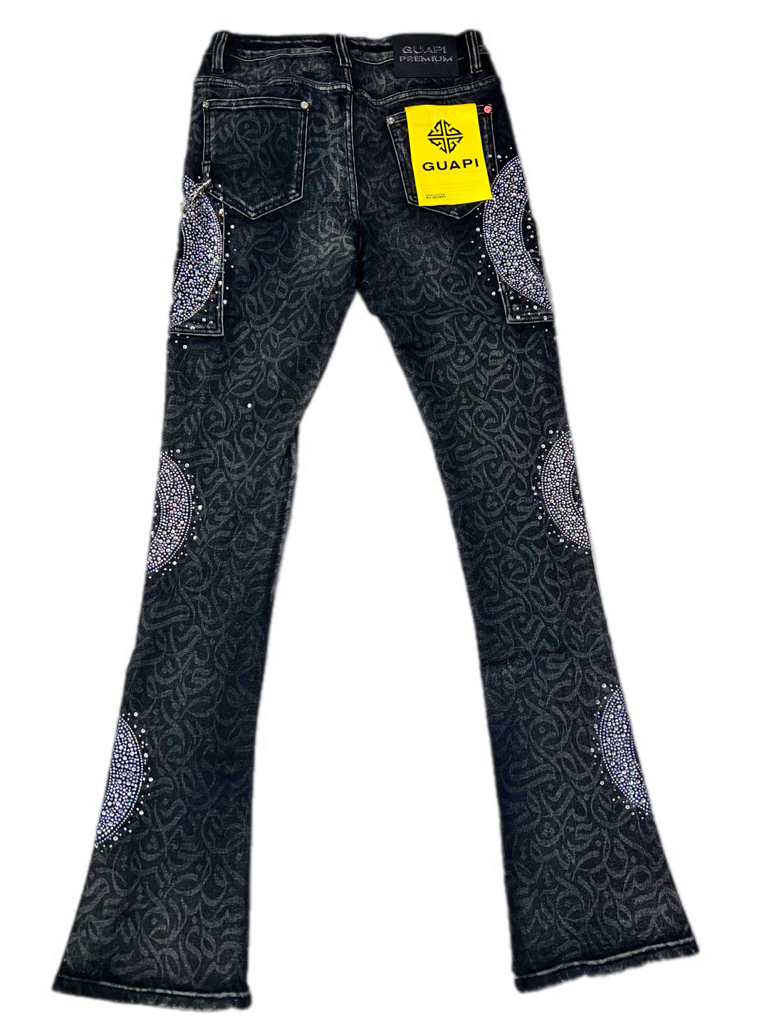 Black jeans with decorative patterns and sequins, featuring a visible brand label on a white background.