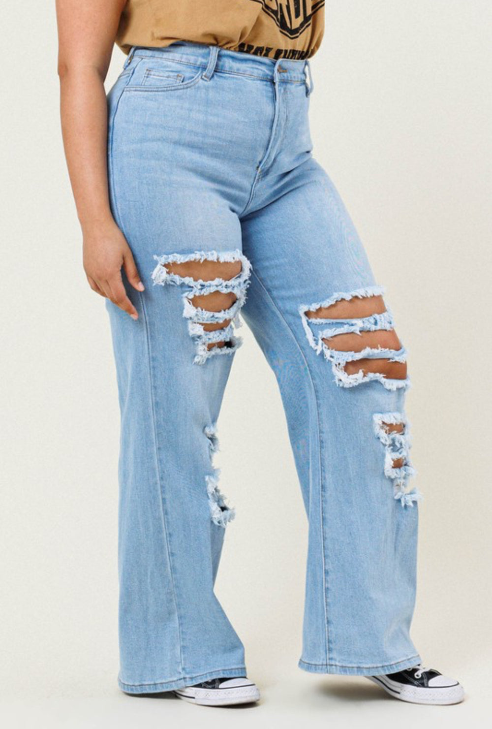 Blue high waisted distressed wide leg jeans side view