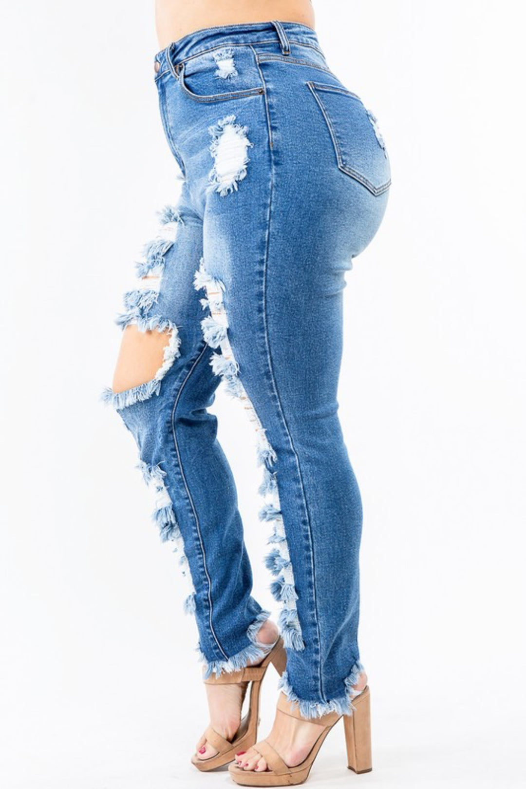 Blue distressed skinny jeans side view