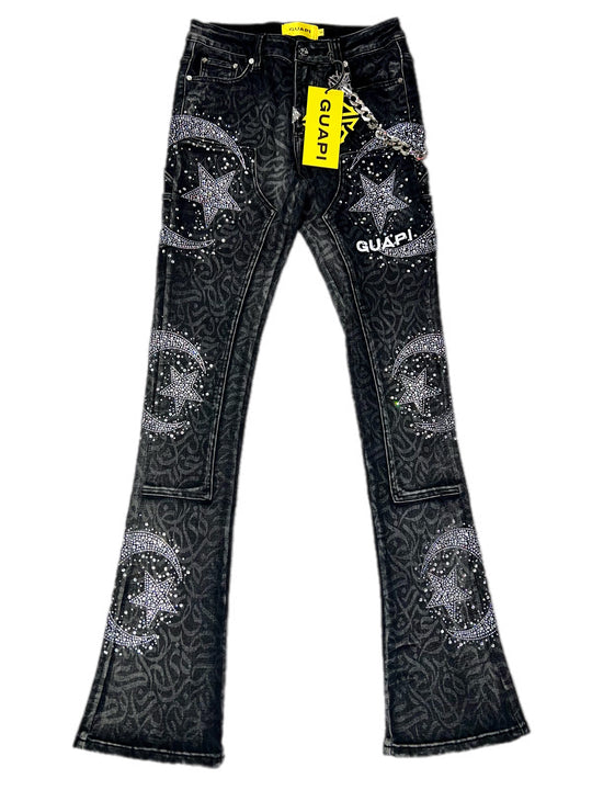 Black jeans with star patterns and rhinestones on a white background