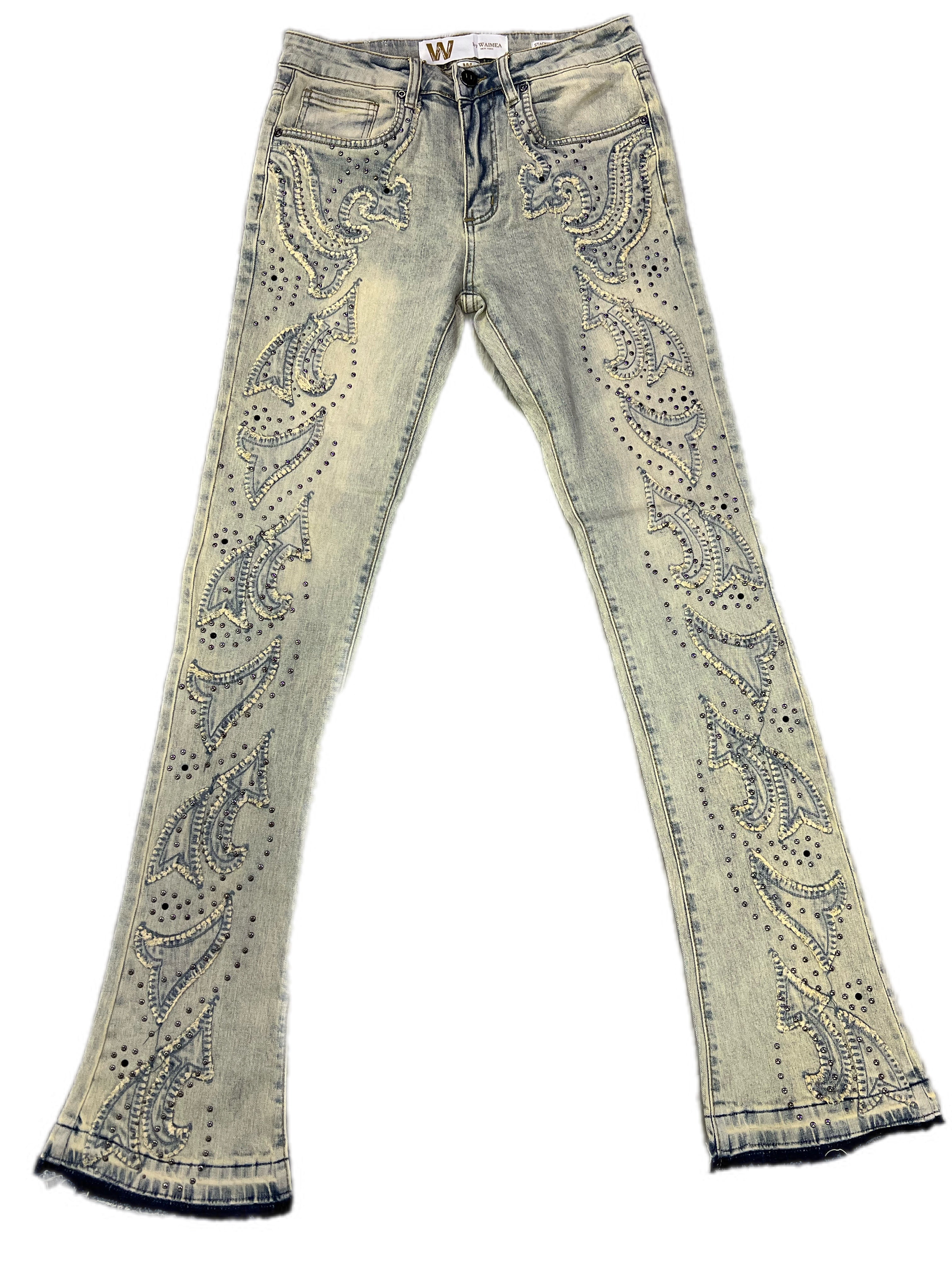 Light blue jeans with paisley patterns on a white background