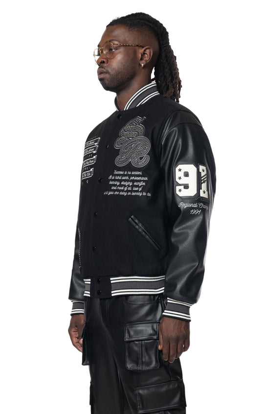 We will achieve studded patch varsity jacket